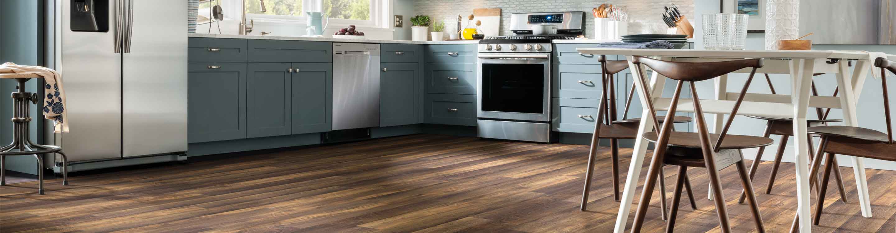 wood-look vinyl flooring in a kitchen and breakfast nook